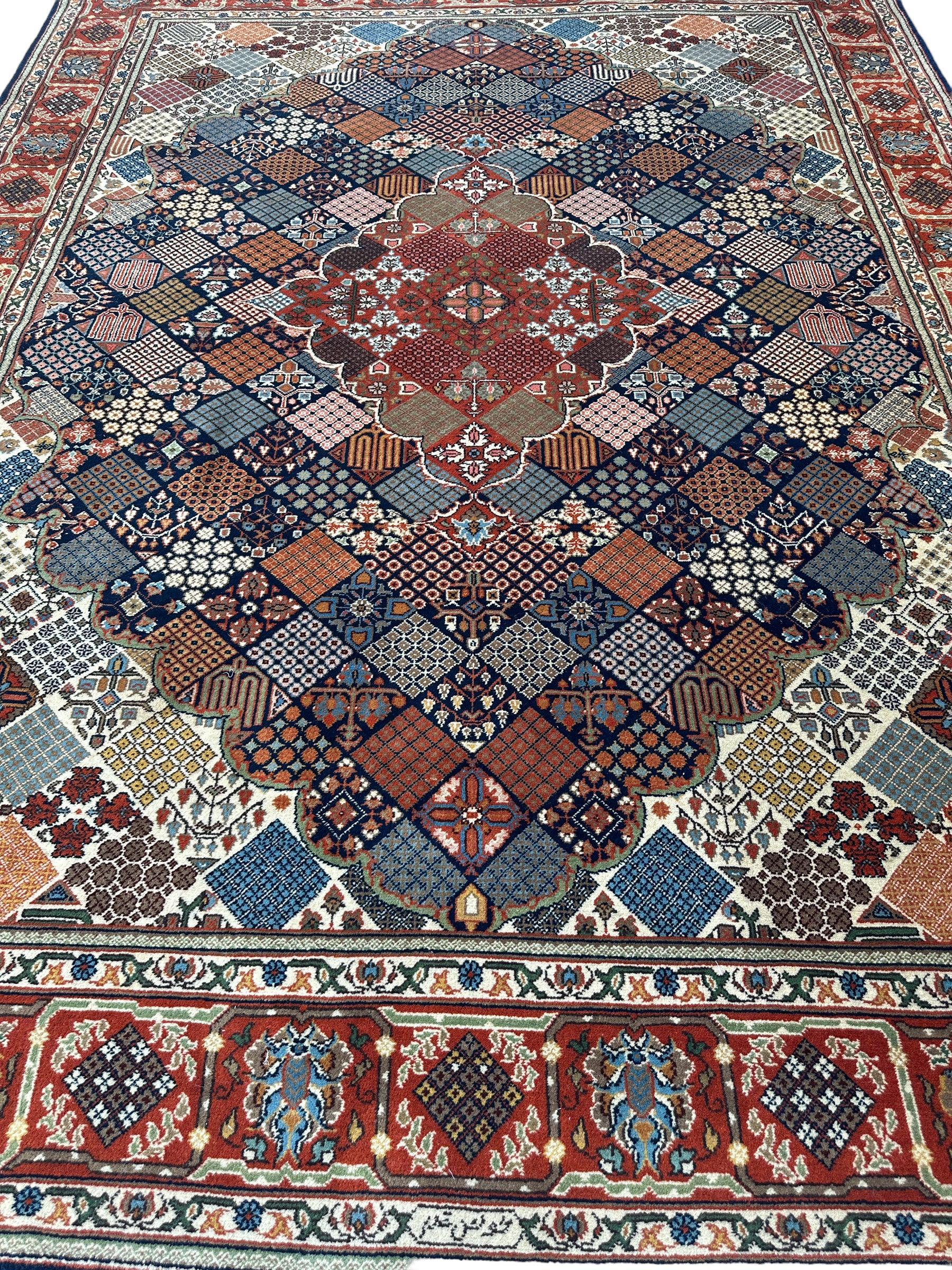 Hand-Knotted Indo-Joshegan Wool Rug – 12'2" x 9'1" – Geometric Medallion Design, Rich Warm Palette - Image 2